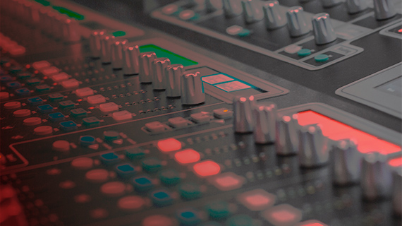 Mixing with MUSIC MAKER A close-up of a mixing console