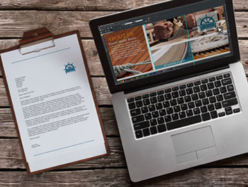 Workstation with laptop and clipboard