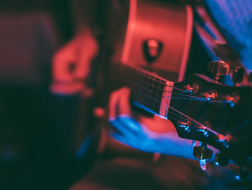 close-up on played guitar
