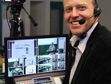 Eckhard Stoll at a presentation with headset